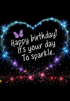 a happy birthday card with sparkles in the shape of a heart on a black background