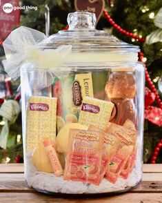 a glass jar filled with different types of snacks