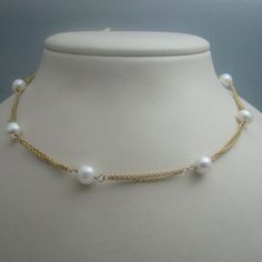 "For sale: (1) d946 14k Yellow Gold Pearl Necklace PLEASE READ ENTIRE DESCRIPTION BEFORE PURCHASING Pre-owned item. Good condition. Please see pictures for details. Sold as is, as seen on pictures. This necklace contains nine (9) pearls. Its stamp could not not be photographed, but it is located on the clasp. Specifics: 14k Yellow gold Cable-style chains Lobster claw Pearls: 7.5 mm around Length: 16.75 inches Width: 3 mm Total Weight: 8.4 grams Please be 100% sure of your purchase before buying, Gold Pearl Necklace, Sterling Silver Chain Necklace, Wedding Jewellery Necklace, Silver Chain Necklace, Fine Jewellery Necklace, Gold Pearl, Wedding Necklace, Silver Watch, Lobster Claw