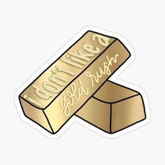 two gold bars with writing on them that say, love lies in the box sticker