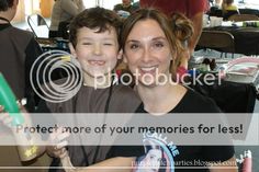 a woman holding a boy in her arms with the caption protect more of your memories for less