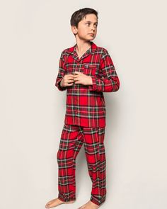 The iconic, classic Scottish plaid that has graced holiday traditions for decades, Imperial Tartan is a celebration of the vibrant hues of the season: scarlet, navy, green and snowy white. The lightweight flannel classic pajama set is accented with navy piping and finished with pearl buttons. The sleepwear is made from the finest quality yarn-dyed cotton and blended with just enough inherently flame retardant fiber to allow it to pass strict CPSC flame retardant laws without using harmful chemic Childrens Christmas Pajamas, Plaid Pajamas Boys, Cotton Pajama Set, Classic Pajamas, Scottish Plaid, Cotton Pajama Sets, Baby Necessities, Navy Green, Shoe Size Conversion