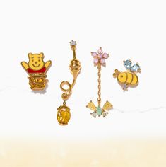 Step into the enchanting world of the Hundred Acre Wood with our Disney Silly Old Bear Earring Set! Adorned with Winnie the Pooh snugly nestled in a hunny pot, a buzzing hunny bee, and a dazzling butterfly, these earrings bring a dash of whimsy to your day. Embrace the hunny-sweet nostalgia and let these earrings sprin Disney Princess Pocahontas, Disney Princess Moana, Disney Princess Tiana, Disney Princess Cinderella, Mermaid Earrings, Disney Jewelry, Bee Theme, Disney Dream, Gemstone Studs