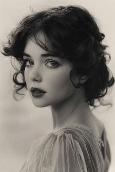 black and white photograph of a woman with wavy hair