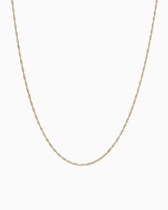 The Twist Chain is the everyday essential you've been looking for. Handcrafted in 14K solid gold, this sleek twisted singapore chain offers a highly textured look that strikes the perfect balance between contemporary and vintage styles. It's a versatile and timeless addition to your jewelry collection. Metal: 14K solid gold Chain Width: 1mm Chain Length: 18" Style #: GVI Everyday Yellow Gold Figaro Rope Chain Necklace, Elegant 14k Gold Tarnish Resistant Rope Chain Necklace, Elegant Yellow Gold Rope Chain Necklace With Curb Detail, Everyday Minimalist Rope Chain Necklace With Figaro Detail, Elegant Yellow Gold Curb Chain Necklace, Classic Rope Chain Necklace With Delicate Link, 14k Gold Rope Chain Necklace With Curb Chain, Classic Everyday Delicate Rope Chain Necklace, Classic 14k Gold Rope Chain Necklace With Delicate Chain