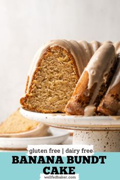 A sliced gluten free banana cake sitting on a cake stand. Milk Free Cake Recipe, Gluten Free Banana Bundt Cake, Dairy Free Banana Cake, Cream Cheese Drizzle, Gluten Free Banana Cake, Nut Free Desserts, Banana Bundt Cake, Banana Bundt, Spiced Cake