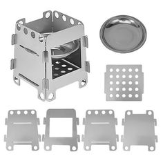 an assortment of metal parts including trays, plates and strainers on a white background