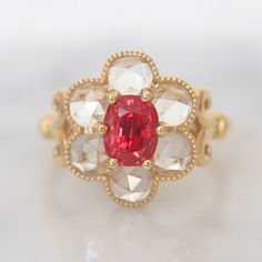 Neon Red pink spinel halo ring. Set with brilliant cut spinels in 14K rose gold. US6. This ring features my mini Edwardian design with 1 piece of eye cleam Cushion Brilliant Cut Light Pink Spinels and 8 pieces of round brilliant cut Lilac Pink Spinels. The size is in US 6 and made of solid 14K gold can be sized up or down for $65 if needed. This item is brand new and one of a kind designed by me.  The certificate will be included and describes the spinel as follows: Measurement Ring Face: 16mm*1 Edwardian Design, Cushion Cut Halo Ring, Halo Ring Set, Red Spinel, Neon Red, Ring Cushion, Pink Spinel, Lilac Pink, Cat Ring