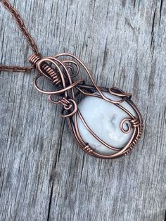 White Wire Wrapped Pendant Jewelry, White Wire Wrapped Round Pendant Jewelry, White Spiritual Wire Wrapped Jewelry, Spiritual White Wire Wrapped Jewelry, Unique White Jewelry For Healing, Wire Wrapped Copper Wire Teardrop Pendant Necklace, Gift Crystal Necklaces With Natural Stones In Copper, Gift Crystal Necklace With Natural Stones And Copper, Copper Wire Necklace With Oval Pendant For Gift