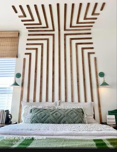 the headboard is made out of wood sticks and has an intricate design on it