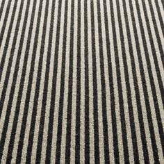 black and white striped fabric with vertical lines in the center, as if it were woven or wovened together