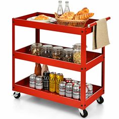 a red cart with food and drinks on it