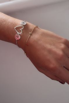 "Lovely personalised two initial bracelet with a heart. It is made from sterling silver. Simple and adorable, personalised bracelet perfect for everyday, for any outfit. Lovely present for Christmas, wedding, bridal shower, anniversary , keepsake, graduation, mother's day or just treat yourself! Please leave the initials wanted at the checkout \"Notes to Seller\" Thank you for looking and choosing hand made. Kind regards, Edite CANCELLATIONS, REFUNDS ETC: All items are sent made to the specifica Sterling Silver Name Bracelet With Heart Charm For Gift, Dainty Personalized Silver Heart Bracelet, Elegant Silver Name Bracelet With Heart Charm, Silver Double Heart Jewelry With Initials, Sterling Silver Heart Bracelet For Personalized Gift, Sterling Silver Heart Bracelet As Personalized Gift, Silver Name Bracelet With Heart Charm For Gift, Silver Name Bracelet With Heart Charm As Gift, Personalized Silver Heart Bracelet With Double Heart Design