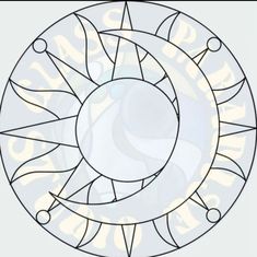 a circular stained glass window with an image of the sun and moon in it's center