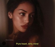 a woman with her eyes closed and the words pure heart, dirty mind