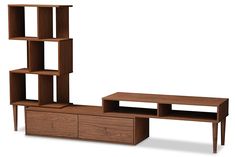 an entertainment center with shelving unit, coffee table and end tables on each side