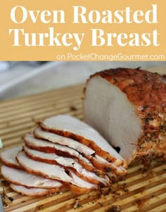 sliced turkey on a bamboo mat with text overlay that reads oven roasted turkey breast