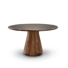 a round wooden table with a black top and brown wood grain on the base, in front of a white background