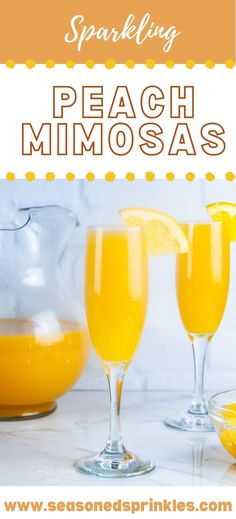 two glasses filled with peach mimosas sitting on top of a white marble counter