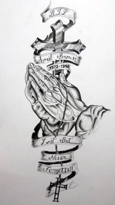 a drawing of a praying hand with crosses and banners around it, on white paper