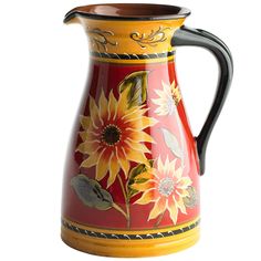 a red and yellow vase with sunflowers painted on it