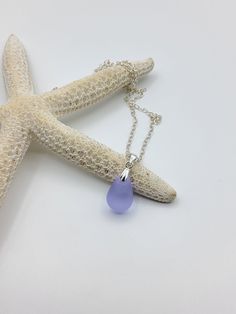 MINIMALIST PERIWINKLE SEA GLASS TEARDROP NECKLACE  ITEM DETAILS  ~ Delicate fine cable chain necklace  ~ Necklace comes with a 1 inch extender chain  ~ Periwinkle purple sea glass teardrop bead ~ 12mm long x 8mm widest point MATERIALS  ~ 925 Sterling Silver  ~ Cultured Sea Glass  MATCHING EARRINGS  https://www.etsy.com/au/listing/1313070834/periwinkle-purple-frosted-glass-teardrop PLEASE NOTE There is a reflection on some of the jewellery pieces in the photos from the LED lightbox I use. They ar Beach Jewellery, Periwinkle Purple, Purple Sea, Teardrop Beads, Necklace Minimalist, Teardrop Necklace, Necklace Necklace, Gift For Girlfriend, Beach Jewelry