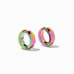 These huggie hoops add a rainbow vibe. Plus, they're clip-ons, so no piercing is necessary to rock these. These clip-on earrings will compliment all your looks. Finish: Rainbow Diameter: 10MM Closure: Clip on Material: Metal - Claire's Rainbow 10MM Clip On Huggie Hoop Earrings Trendy Small Hoop Rainbow Jewelry, Trendy Rainbow Small Hoop Jewelry, Trendy Rainbow Hoop Jewelry, Small Rainbow Hoop Earrings For Pierced Ears, Modern Multicolor Small Hoop Earrings, Everyday Hypoallergenic Hoop Clip-on Earrings, Multicolor Modern Small Hoop Earrings, Rainbow Hoop Earrings For Pierced Ears, Multicolor Huggie Hoop Earrings