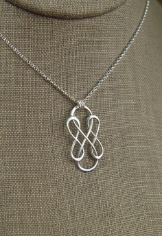 Triple infinity necklace in sterling silver, sterling silver necklace, infinity, eternity necklace, friendship, mother's day A sterling silver triple infinity symbol link that measures 1.18 x 0.59 inches (30 x 15mm) is suspended from a sterling silver chain with 3 jump rings and the chain can be any length up to 22 inches. It is secured with a sterling silver spring ring clasp. Your purchase will arrive in a jewelry box ready for gift giving or as a gift for yourself! Enter my shop here: jersey6 Cheap Infinity Shaped Jewelry Gift, Modern Infinity Necklace As Gift, Modern Twist Infinity Necklaces As Gifts, Nickel-free Jewelry With A Modern Twist For Gifts, Modern Twist Infinity Necklace As Gift, Modern Twist Infinity Necklace For Gift, Modern Twist Infinity Necklace For Gifts, Modern Twist Nickel-free Jewelry Gift, Silver Infinity Jewelry For Anniversary