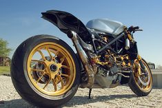 a motorcycle parked on the side of a road