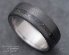 ✯ This ring is made with the following options: ◎ Core Ring ⤚ ⟶ Unidirectional ⟷ Width ⤚ ⟶ 7mm ❍ Inner Sleeve: ⤚ ⟶ Titanium ⑉ Design ⤚ ⟶ Off-Center ◈ Inlay ⤚ ⟶  Black Onyx ✎ Engraving ⤚ ⟶ Available ⌯ Fit ⤚ ⟶ Comfort We offer the most accurate way to confirm (and feel confident about) your ring size at home. Try before you buy by following the link below: https://www.etsy.com/listing/1441433726/test-rings If you have any questions check out the FAQ section down below or contact us directly. Thing Ring Carbon, Carbon Fiber Ring, Wedding Band Engagement Ring, Carbon Fiber Rings, Inlay Design, Black Onyx Stone, Stone Inlay, Men Ring, Black Onyx Ring