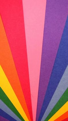 an assortment of different colors of paper