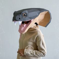 Cobra Mask Papercraft, Snake, Digital Template, PDF Download, Gurko, 3D LowPoly, Pepakura, DIY Origami Sculpture, New Year Christmas Costume Digital file, pdf format. Paper art of the «Cobra Mask» 500 х 450 х 360 mm in size. The model consists of 60 parts 20 sheets of A4 size. To assemble the model, you need to print the file yourself. Stationery knife, glue, ruler. All lines of creation are drawn from the inside of details. Splice of the model should be realized in the order of numbers. RUS Эле Snake Template, Blast Over Tattoo, Mask Papercraft, Low Poly Mask, Animal Mask, Paper Magic, Paper Mask, 3d Origami, Diy Origami