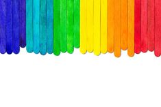 the rainbow sticks are lined up in different colors