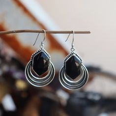 Magnificent Black Onyx Earring, Unique Designer Earring, 925 Silver Earring, Natural Black Onyx, Women For Earring, Stunning Earring Metal :- 925 Sterling Silver Style : Earrings Gemstone:- Black onyx Benefits Of Black onyx  Has antioxidant properties. Antioxidants are known to provide a host of health benefits. ... May boost heart health. ... May lower "bad" LDL cholesterol. ... May improve gut health. ... May help reduce blood pressure. ... May help reduce the risk of stroke. ... May lower blood sugar levels. ... May help reduce the risk of cancer. Occasion : Birthday Events, Lovely Valentine's Day Gift, Anniversary Gift, Weeding Gift, Engagement Ring, Lover Gift Ring, Hen Party And Other Occasion.... Your order will be handmade and ready for shipment in 1 to 1 business days Normally we Elegant Black Sterling Silver Hoop Earrings, Silver Onyx Earrings Perfect As A Gift, Nickel-free Silver Onyx Earrings, Black Sterling Silver Dangle Earrings, Black Sterling Silver Drop Plug Earrings, Black Sterling Silver Dangle Plug Earrings, Black Sterling Silver Drop Earrings, Onyx Drop Earrings For Pierced Ears, Pierced Onyx Drop Earrings