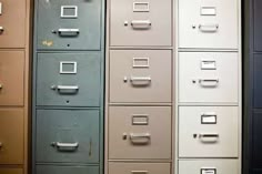 several filing cabinets with different colors and sizes