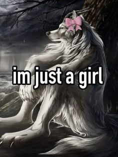 a wolf with a pink bow sitting on the ground in front of a dark forest