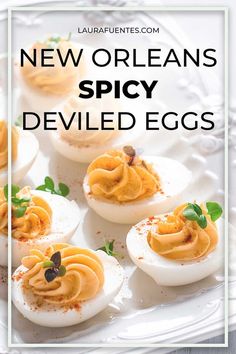 new orleans spicy deviled eggs on a white plate with text overlay that reads, new orleans spicy deviled eggs