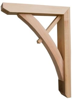 a wooden shelf with a curved design on it