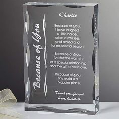 a clear glass plaque with a poem on it