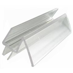 two clear plastic sheets are stacked on top of each other in the shape of an arrow