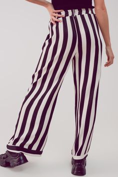 Full length. Pants. Stripe design. Relaxed fit. Wide leg. Daily. Elasticated waist. Glossy satin-style fabric . Side pockets . Functional pockets. Elasticated waist. runs true to size. S. 100% Viscose Trousers Women Wide Leg, Stripe Pants, High Neck Top, Trouser Pants Women, Online Fashion Boutique, Wide Waistband, Striped Pants, Black Media, Wide Leg Trousers