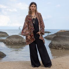 Zinnia Pearl 🌿✨ Experience the Opulent Aura of our Mei Velvet Whispers Kimono 🌿✨  * Handcrafted with love, this piece adds elegance to your wardrobe all year round * Luxurious printed cotton velvet for a classic yet versatile look * Perfect for festive gatherings or meaningful gifts, with a flattering plus size fit * Rich in texture, exuding sophistication in every stitch * Fully lined with wide sleeves for ultimate comfort and style * Oversized silhouette with an open front design * Short len Velvet Kimono, Plus Size Fits, Holiday Wedding, Boho Summer, Oversized Silhouette, Kimono Jacket, Wide Sleeves, Cotton Velvet, Front Design