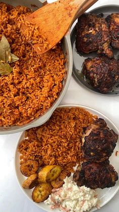 three bowls filled with rice, meat and other food on top of a white table