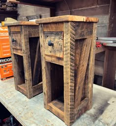 two wooden crates sitting on top of a table