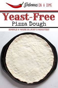 a pizza dough in a cast iron pan with the words yeast - free pizza dough on it