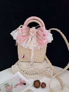 Original Handmade Straw Woven Bag with Shoulder Strap, featuring Lolita Style Cherry Blossom and Bow Design.  This product only includes one bag. Other products need to be purchased separately through their respective links.   	 		 			Size 			Free Size 		 		 			Width 			21cm 		 		 			Height 			20cm Kawaii Handbags, Steampunk Fashion Female, Lace Bag, Steampunk Fashion Male, Beaded Hat, Steampunk Accessories, Cute Handbags, Outfits With Hats, Bow Design