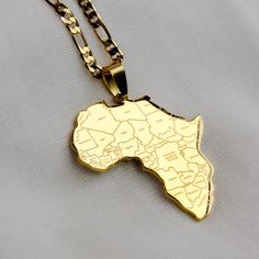 One Africa Map with all African Country names - Pendant size: 4cm x 3.7cm - Available with 45cm/18" or 60cm/24" Figaro chain - Pendant material: Gold Plated Stainless Steel - Does not rust or tarnish - Perfect for layering Africa Chain, All African Countries, Africa Continent, Country Names, Africa Map, Figaro Chains, Figaro Chain, African Countries, West Africa