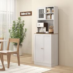 a white cabinet sitting next to a wooden table