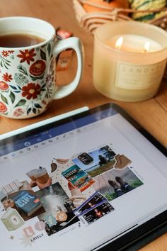 a tablet computer sitting on top of a wooden table next to a cup of coffee