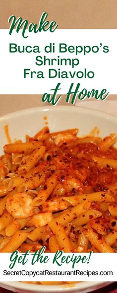 a white plate topped with pasta covered in sauce